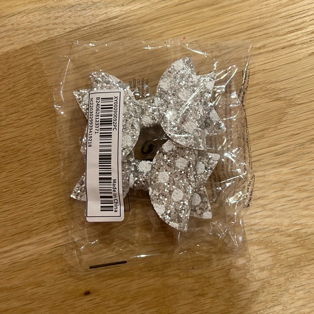 NWT silver glitter with white dots hair bows